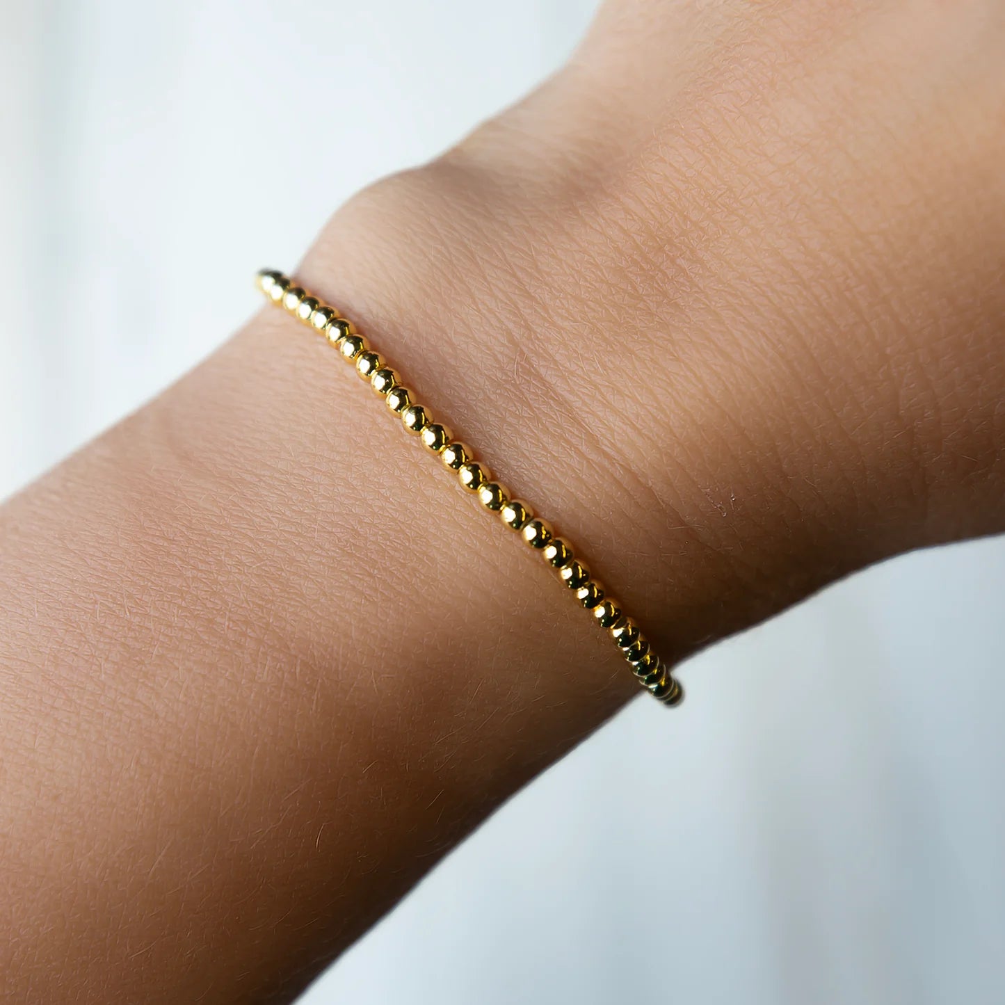 LENNY & EVA 3MM SMOOTH GOLD STRETCH BRACELET