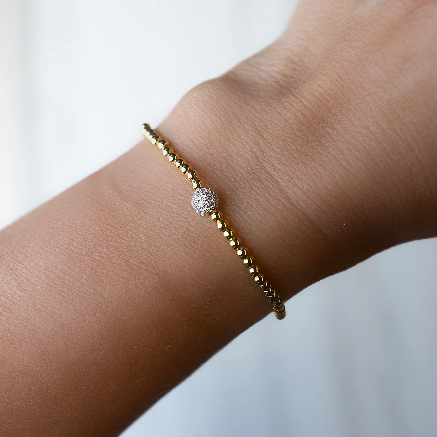LENNY & EVA 3MM GOLD W/SILVER SPARKLE BALL STRECTH BRACELET