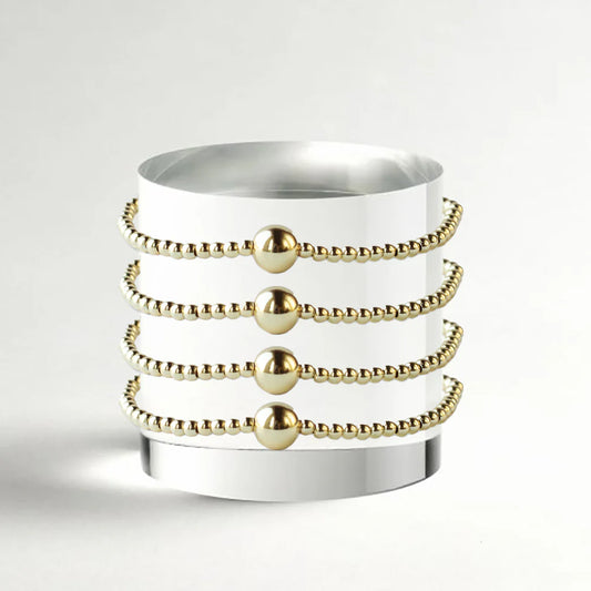 LENNY & EVA 3MM SMOOTH GOLD WITH BALL STRETCH BRACELT