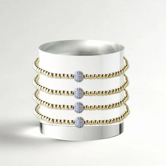 LENNY & EVA 3MM GOLD W/SILVER SPARKLE BALL STRECTH BRACELET