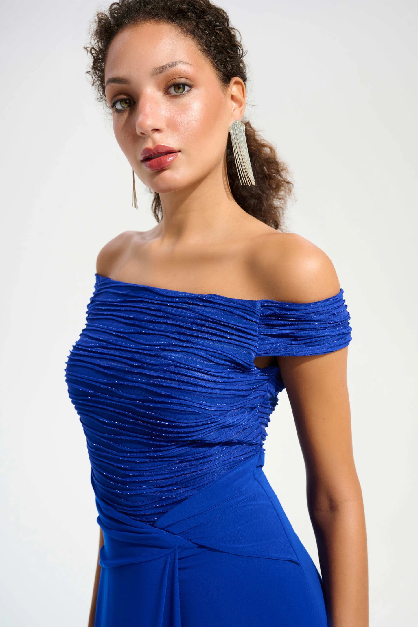 SILKY KNIT CASCADE OFF THE SHOULDER GOWN
