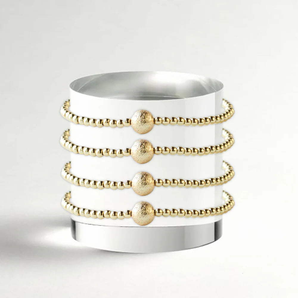 LENNY &EVA 3MM  GOLD W/TEXTURED BALL STRETCH BRACELET