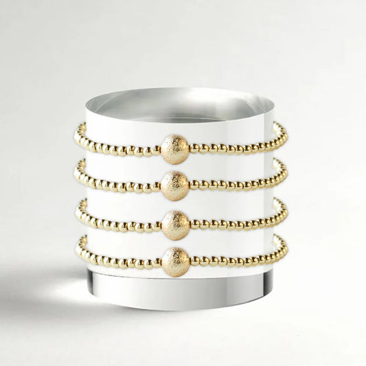 LENNY &EVA 3MM  GOLD W/TEXTURED BALL STRETCH BRACELET