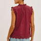 AVERY SLVLESS RUFFLED NECKLINE EYELET DETAIL
