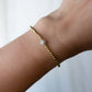 LENNY & EVA 3MM GOLD W/SILVER SPARKLE BALL STRECTH BRACELET
