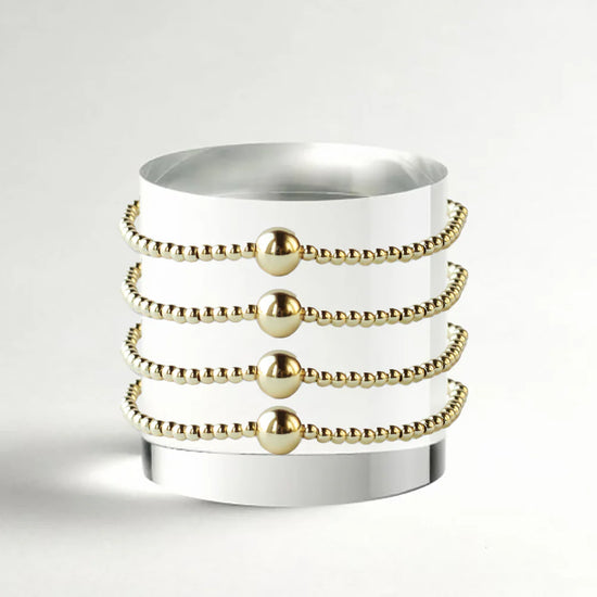 LENNY & EVA 3MM SMOOTH GOLD WITH BALL STRETCH BRACELT