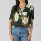 THE LAINEY BUTTON FRONT RUFFLE TRIM BLOUSE