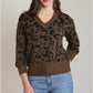 THE LANA V NECK LEOPARD PRINT SWEATER